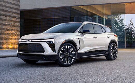 Iridescent Pearl Tricoat 2024 Chevy Blazer EV Beautifully Displayed Outside a Modern Home